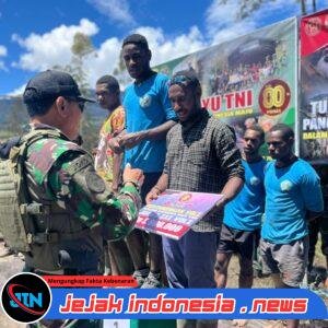 Semangat Persatuan Bergema di Ilaga: Satgas Yonif 700/WYC Tutup Turnamen Volly Piala Pangkogabwilhan III