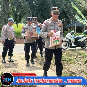 *Kepedulian Kapolsek Banda Alam, Hadir Ringankan Beban Warga Kurang Mampu*