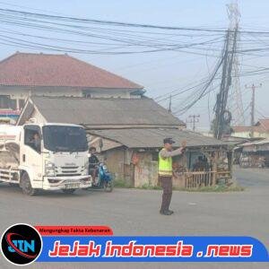 Beri Kenyamanan Di Jalan Raya, Bhabinkamtibmas Polsek Bojonegara Gelar Strong Point