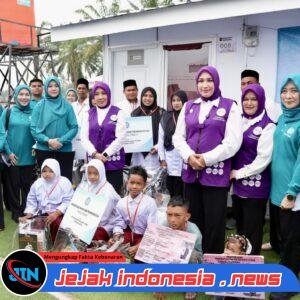 *Ketum Posyandu Tri Tito Karnavian Dorong Pemulihan Warga Huntara Aceh Utara Lewat Bantuan Sosial dan Senam Sehat*
