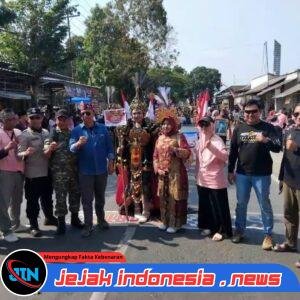 Polsek Jenggawah Sigap Amankan Karnaval HUT ke-81 Republik Indonesia di Desa Kertonegoro, Kecamatan Jenggawah