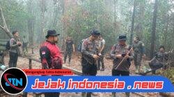*Hujan Bantu Basahi Lahan Bekas Karhutla, Brimob Kalteng Tetap Pantau Bara Api*